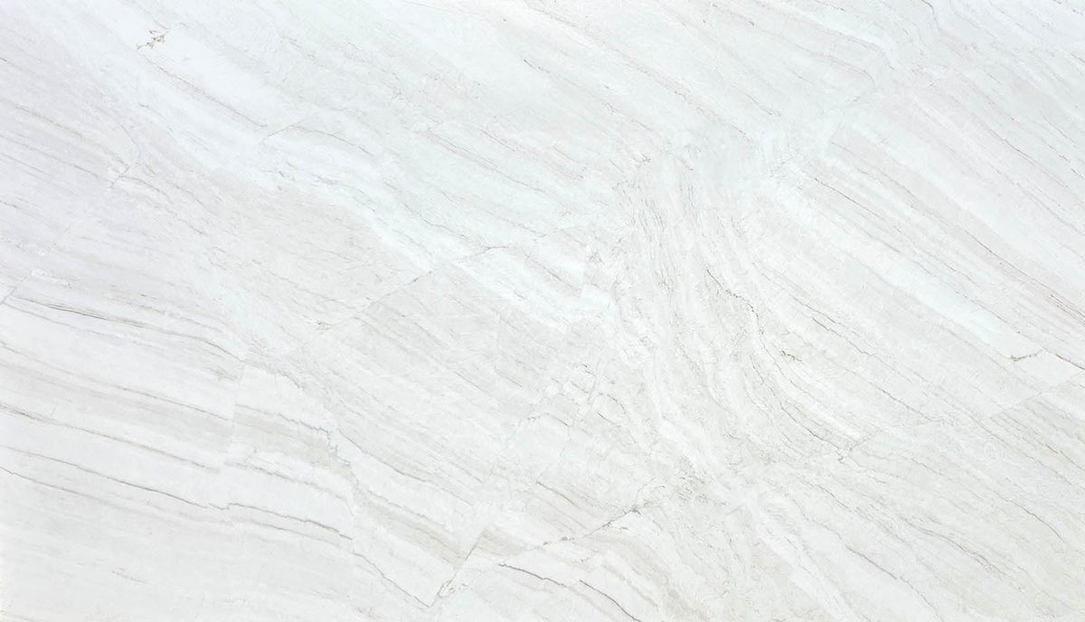 White quartzite slab with soft gray and beige wavy veining