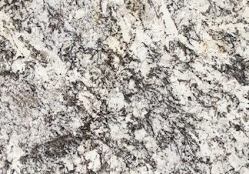 White Delicatus granite slab displayed